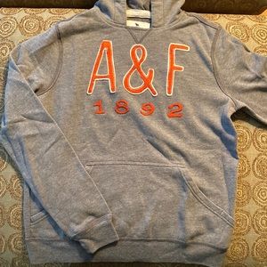Abercrombie Kids charcoal gray hoodie size 15/16 with orange lettering.
